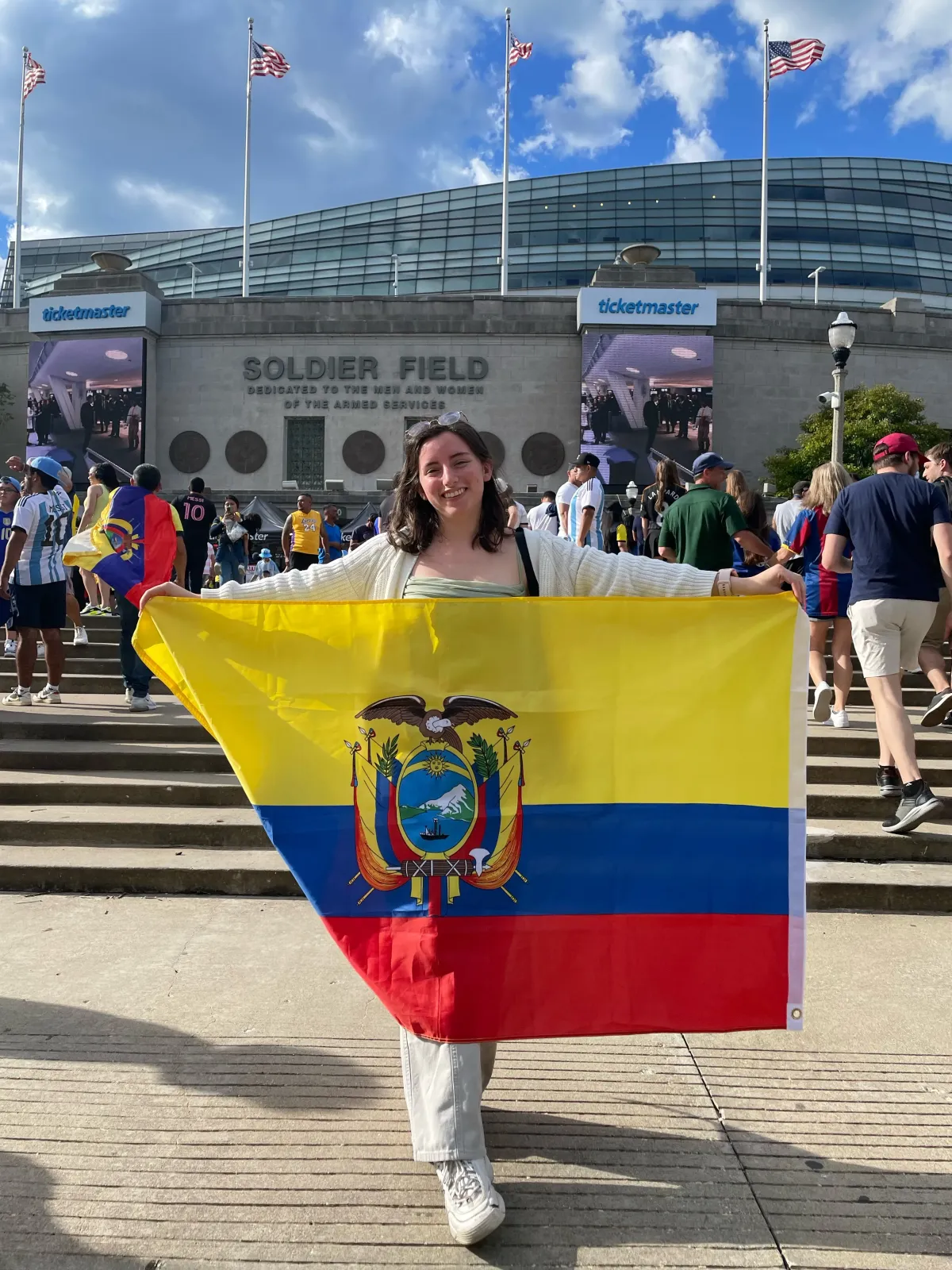 Students with the Ecuador flag at a US stadium