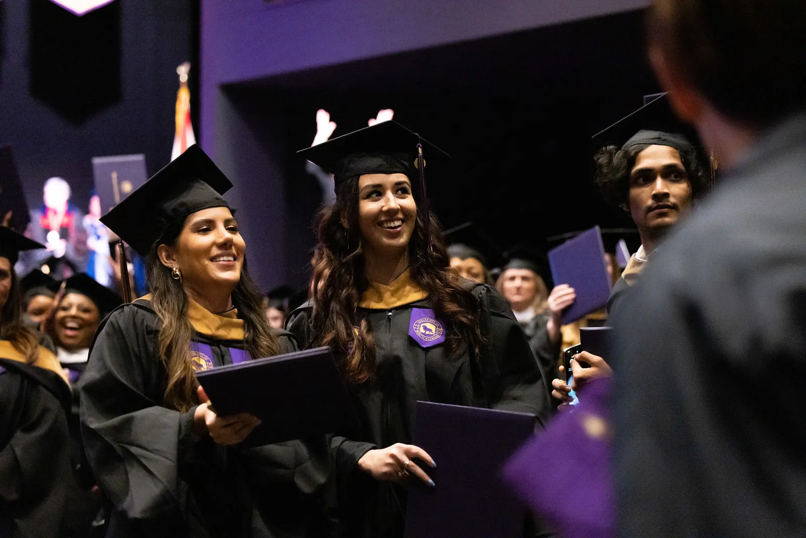 AUP graduates receiving their diploma