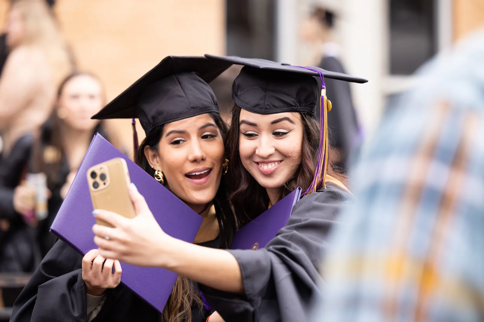 Graduates taking a selfie